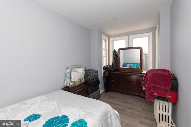 bedroom featuring light hardwood / wood-style floors