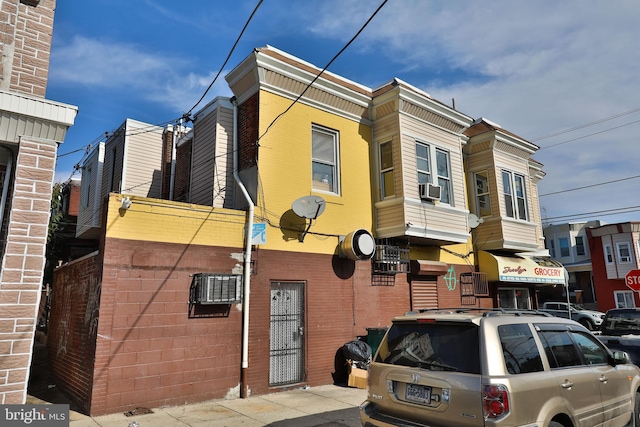 view of property featuring cooling unit