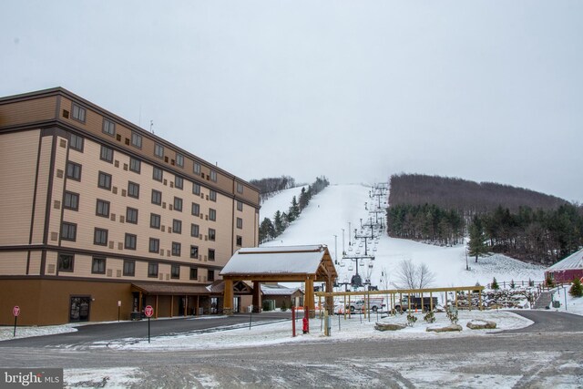 exterior space featuring a mountain view