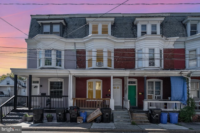 multi unit property featuring covered porch