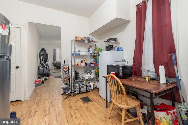 office space featuring light hardwood / wood-style flooring