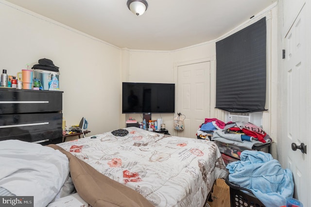 bedroom featuring ornamental molding