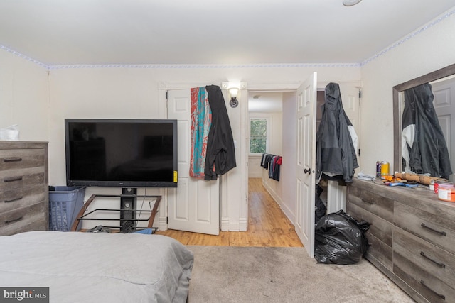 bedroom featuring light hardwood / wood-style floors