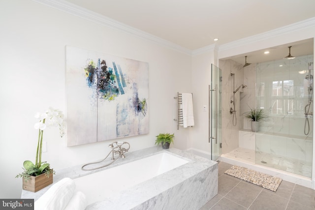 bathroom featuring shower with separate bathtub, tile patterned flooring, and ornamental molding