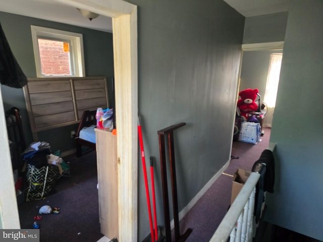 bedroom featuring dark colored carpet