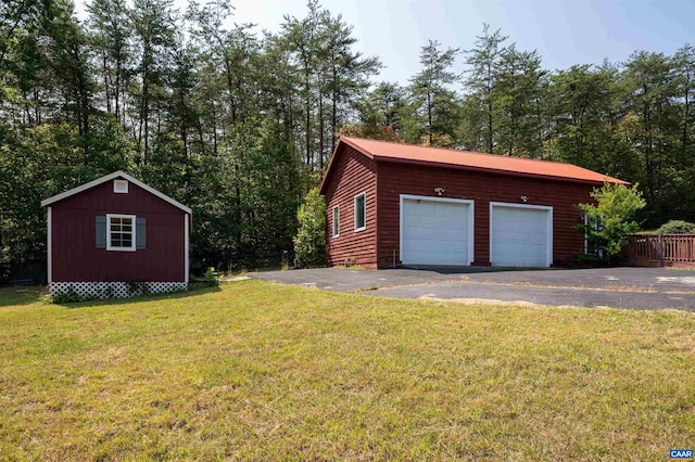 garage with a lawn