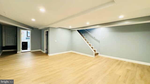 basement with light wood-type flooring