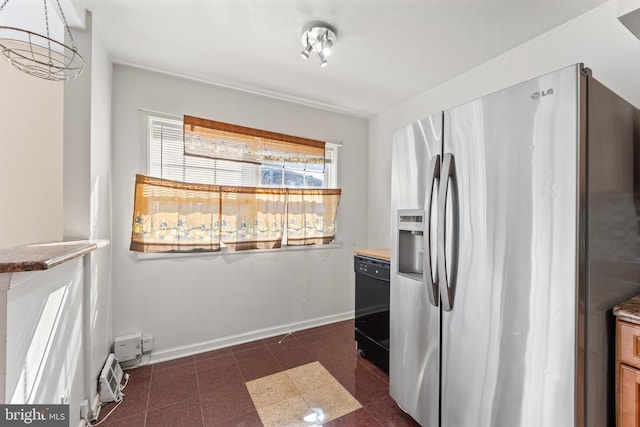 kitchen with stainless steel fridge and dishwasher