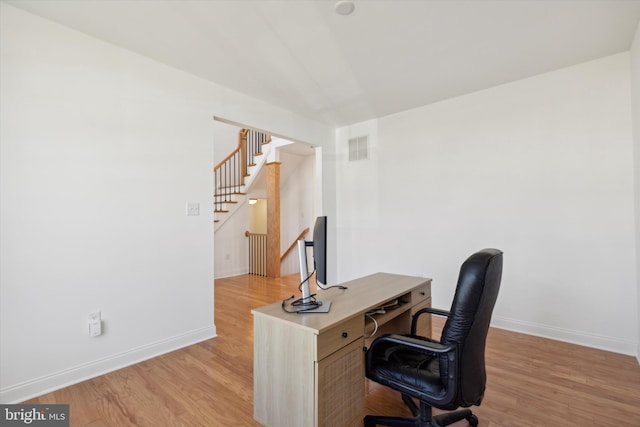 office area featuring light hardwood / wood-style floors