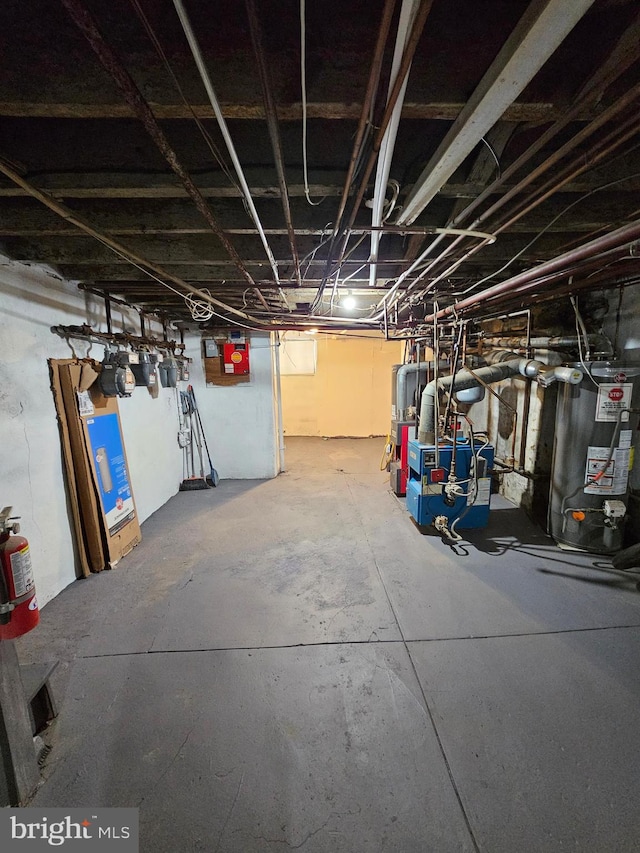 basement featuring water heater