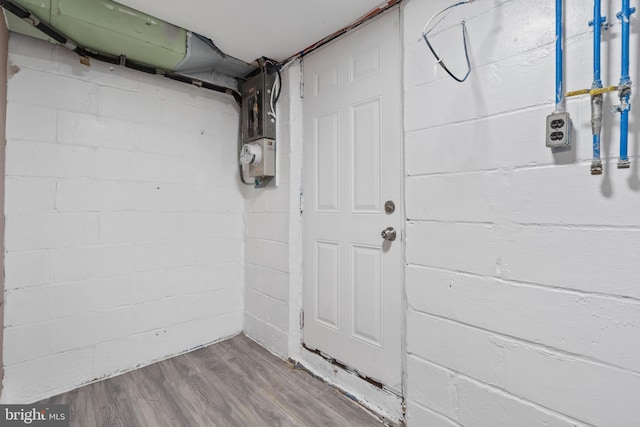 basement featuring hardwood / wood-style floors