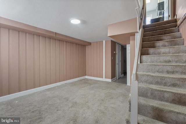 basement with carpet flooring