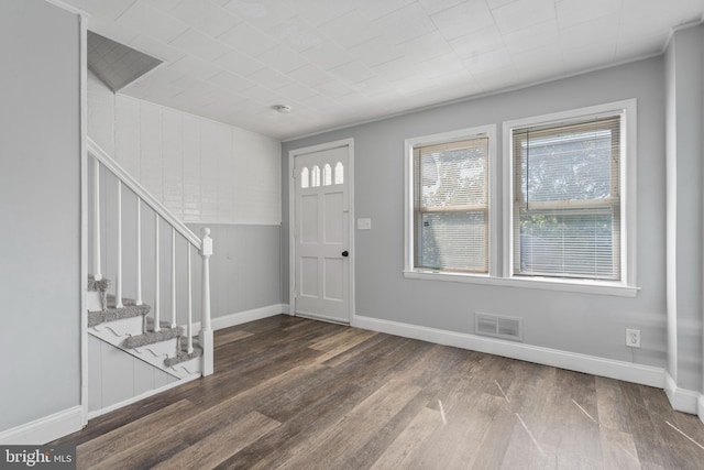 entrance foyer featuring dark wood-type flooring