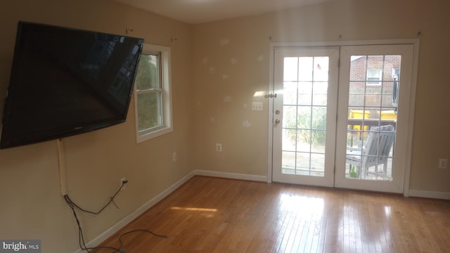 entryway with light hardwood / wood-style floors