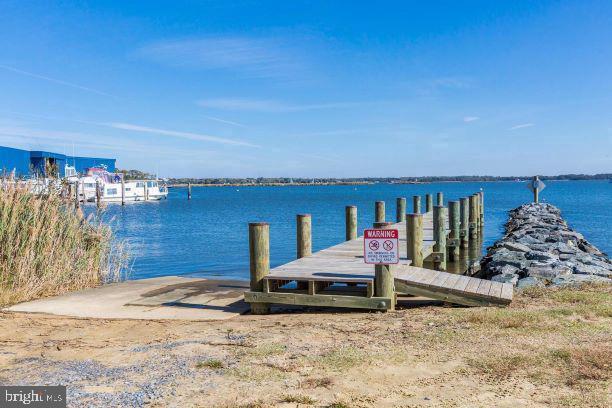 view of dock with a water view