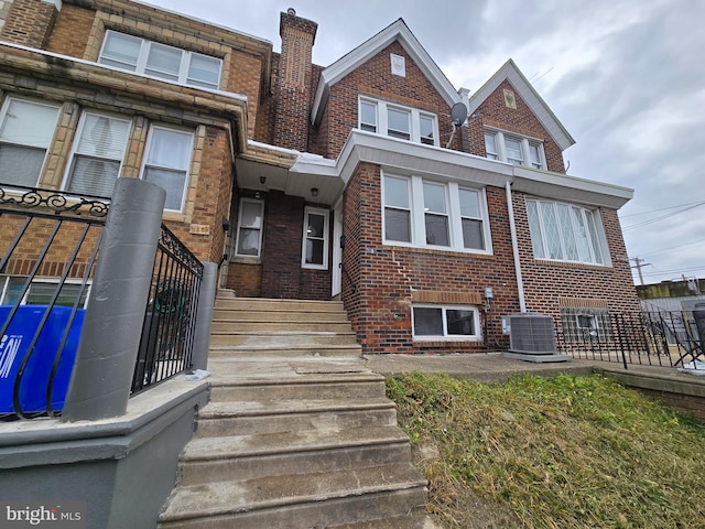 view of front of house featuring central AC