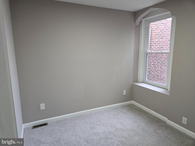 unfurnished room with carpet