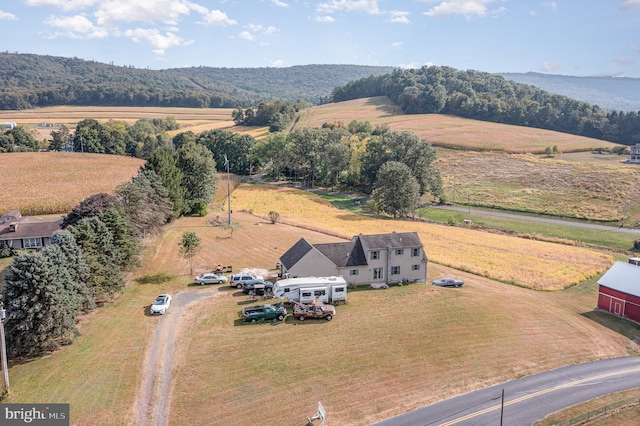 birds eye view of property featuring a rural view