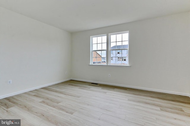 empty room featuring light wood-type flooring