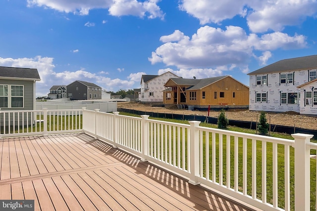 deck featuring a lawn