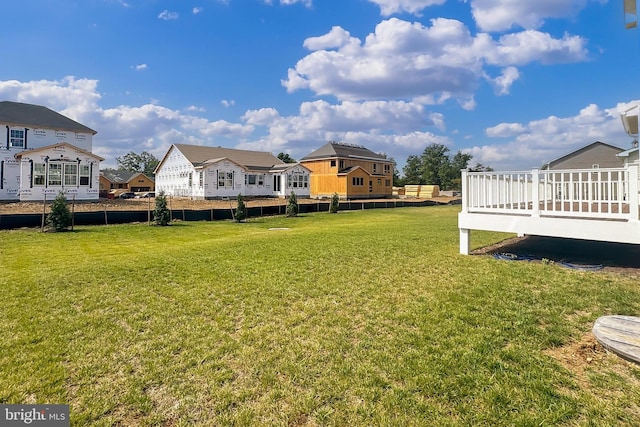 view of yard with a deck