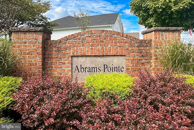 view of community sign