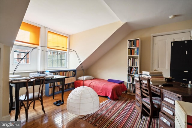 bedroom featuring hardwood / wood-style flooring
