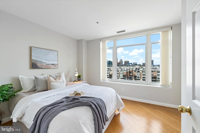 bedroom featuring light wood-type flooring