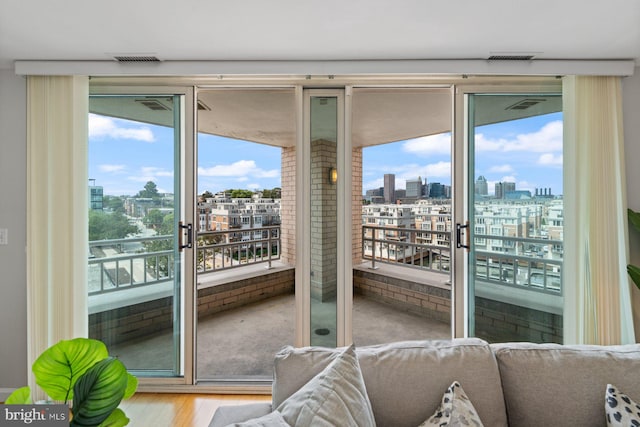 interior space featuring a wealth of natural light and light hardwood / wood-style floors