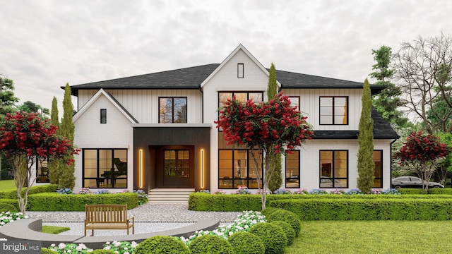 modern farmhouse featuring a front yard