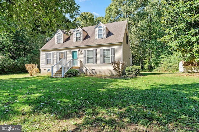 cape cod house with a front lawn