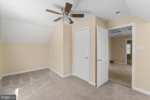 bonus room with light colored carpet, ceiling fan, and vaulted ceiling