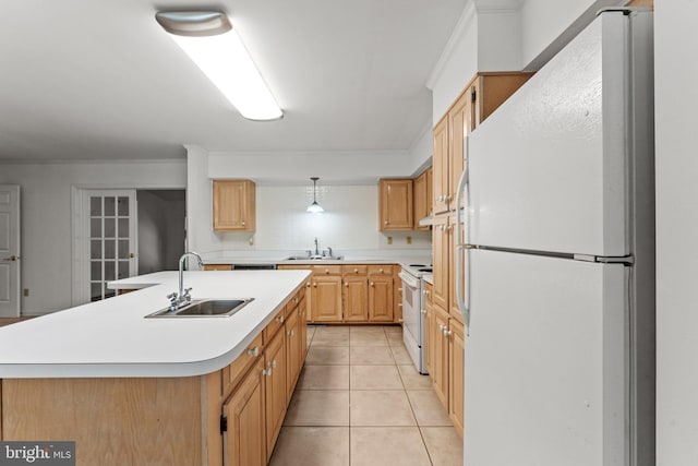 kitchen featuring a kitchen island with sink, white appliances, light tile patterned floors, sink, and decorative backsplash