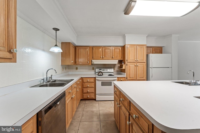 kitchen with pendant lighting, sink, white appliances, and light tile patterned flooring