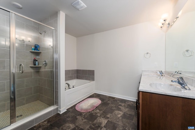 bathroom with plus walk in shower and vanity