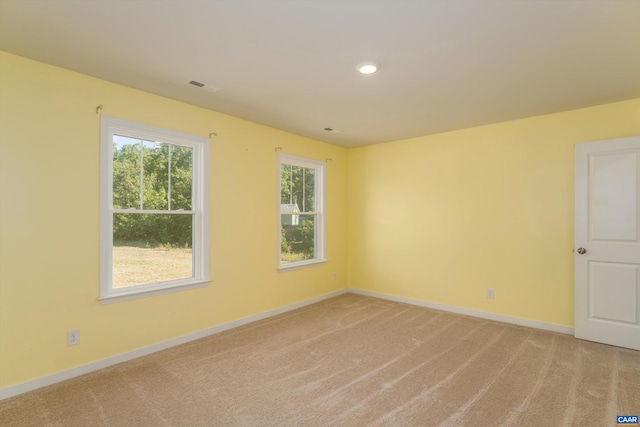 view of carpeted spare room