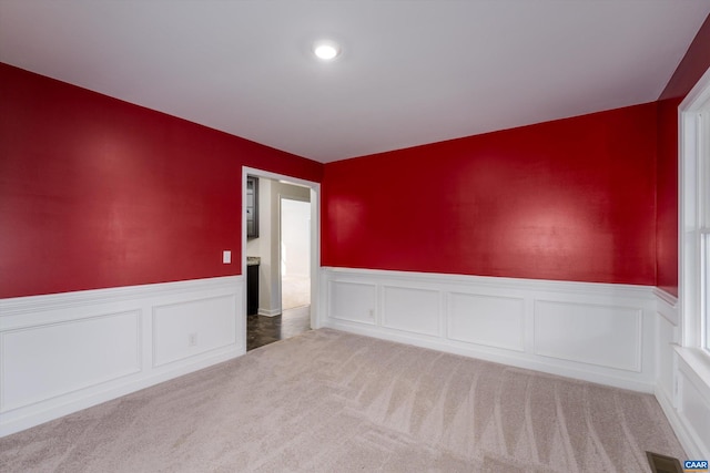 view of carpeted spare room