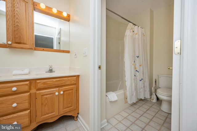 full bathroom featuring vanity, toilet, and shower / bath combination with curtain