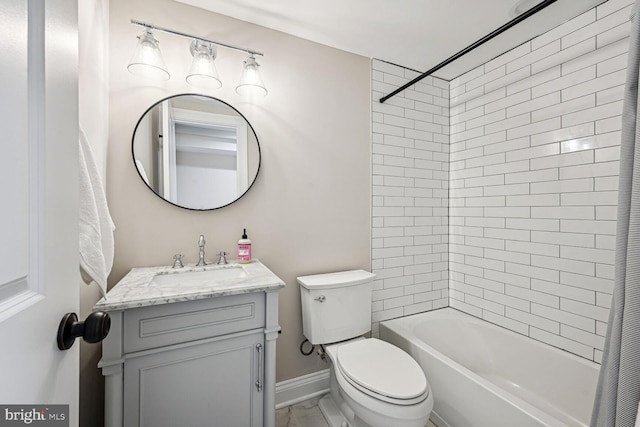 full bathroom featuring shower / bath combo, vanity, and toilet