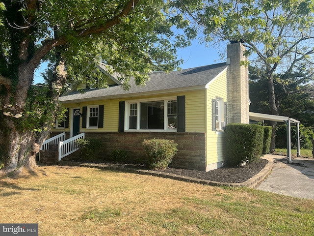 ranch-style home with a front yard