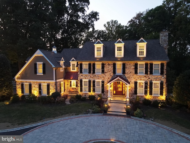 colonial house with a front lawn