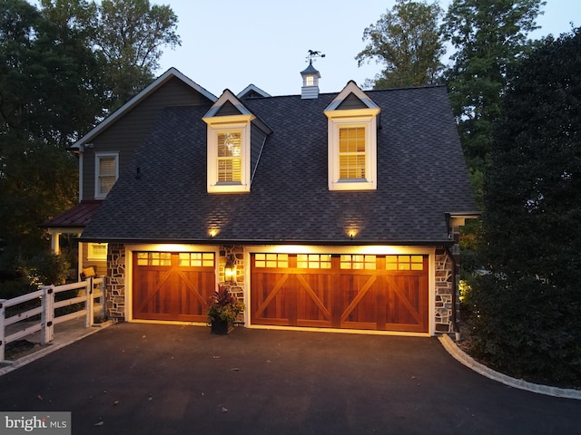 view of front of home featuring a garage