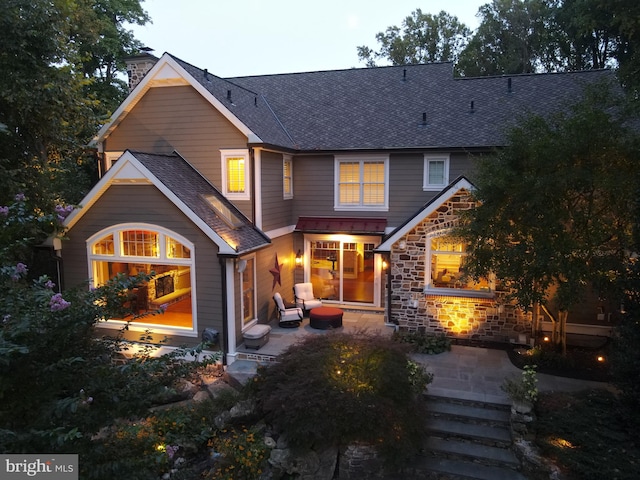 back of house featuring a patio