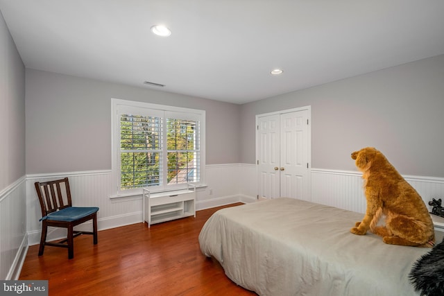 bedroom featuring a closet and hardwood / wood-style floors