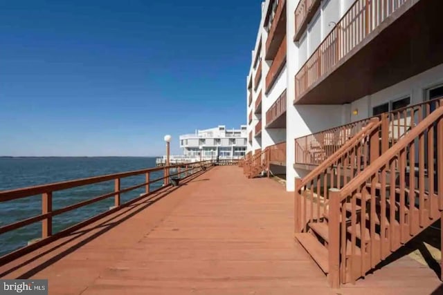 dock area featuring a water view