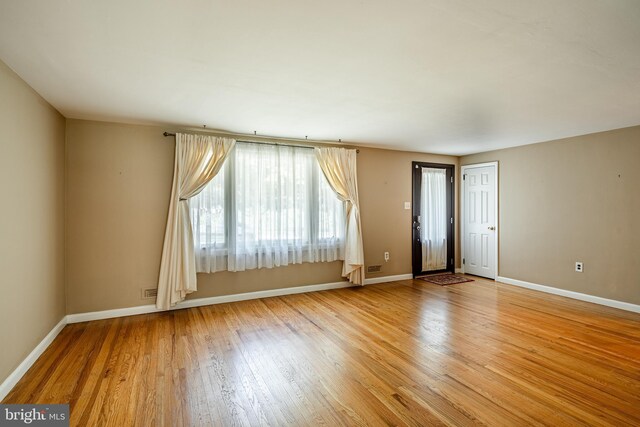 empty room featuring light wood-type flooring