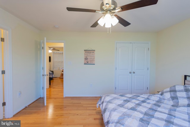 bedroom with a closet, ceiling fan, and light wood-type flooring