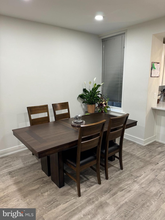 dining room with light hardwood / wood-style floors