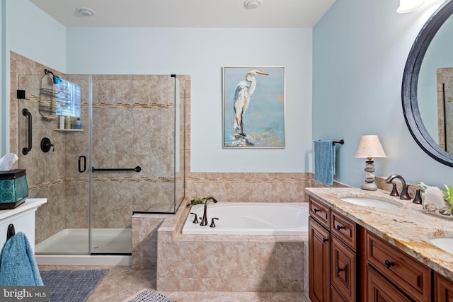 bathroom featuring vanity, separate shower and tub, and tile patterned floors