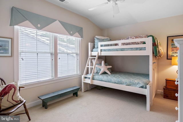 carpeted bedroom with lofted ceiling and ceiling fan